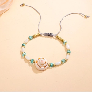 Bracciale estivo bohémien con conchiglie naturali e pietre colorate con cordino regolabile