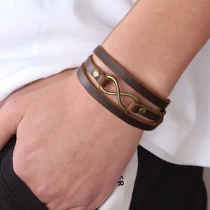 Retro dark brown multilayer leather bracelet for men featuring a bronze infinity symbol
