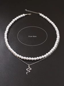 Detailed view of double-layer necklace with pearls, silver snake pendant, 51cm-56cm