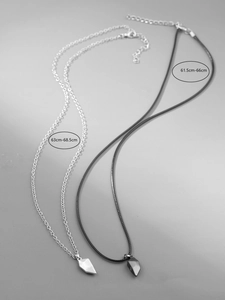 Detail view of magnetic heart couple necklaces with adjustable chain length measurements