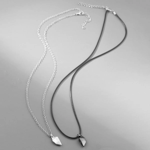 Magnetic heart pendant necklace set with polished silver chain and black woven cord