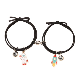 Magnetic astronaut and rocket couple bracelets with elastic cords and charms
