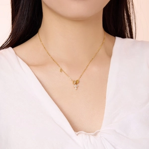 Exquise chaîne en argent S925 doré avec pendentif croix et accents circulaires pour femmes