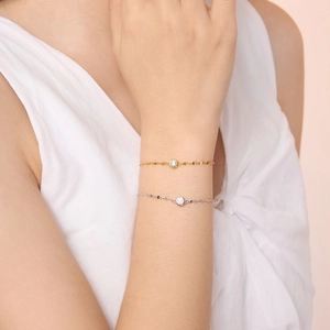 Elegant S925 sterling silver chain bracelet with a sparkling single diamond pendant