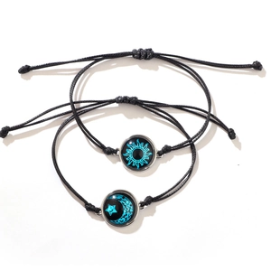 Juego de pulseras de cuero trenzado con sol y luna luminosos para parejas ajustable