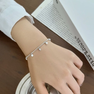 Élégant bracelet en argent S925 pour femme avec des perles et un pendentif coeur
