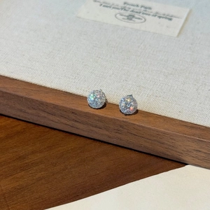 Classic S925 sterling silver halo stud earrings featuring sparkling round moissanite