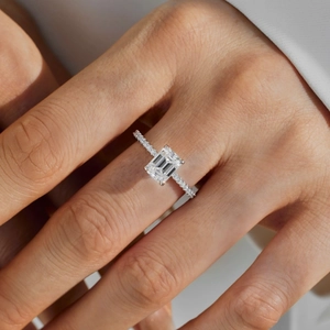 Elegant S925 silver ring featuring a 2-carat emerald cut moissanite with micro-pave band