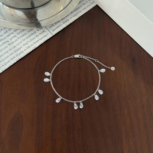 Elegant S925 sterling silver bracelet with pear-shaped cubic zirconia charms and lobster clasp