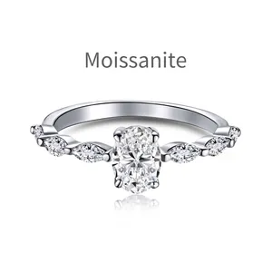 Elegant 0.8ct oval moissanite silver ring with marquise side stones on white background