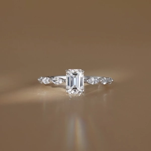 925 silver engagement ring with 1ct emerald cut moissanite and side stones