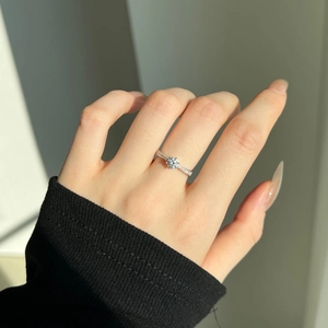 Close-up of S925 sterling silver ring featuring a 0.5 carat diamond in a six-prong setting
