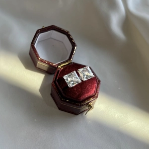 Sparkling S925 sterling silver square stud earrings presented in a luxury red velvet box