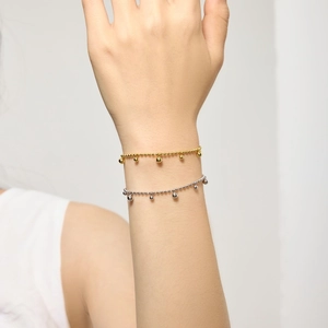 Bracelet à billes double rang en argent S925 avec pendentifs cœur en finitions or et argent