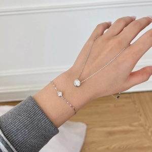 Minimalist S925 sterling silver jewelry set featuring a round solitaire necklace and bracelet