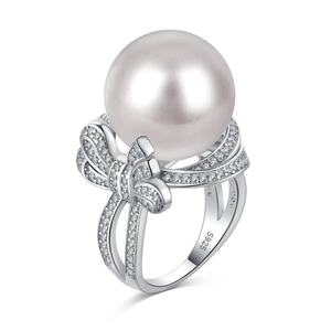 S925 sterling silver bow ring featuring a premium pearl and zircon inlay on white background