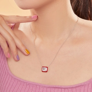 Detail of S925 silver necklace with square clear zircon and red enamel border