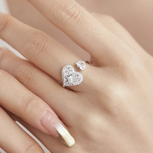 S925 sterling silver open ring featuring sparkling heart-shaped cubic zirconia on hand