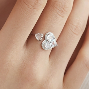 Macro shot of S925 sterling silver heart ring with sparkling cubic zirconia inlay