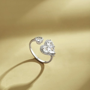 Elegant S925 sterling silver open heart ring featuring sparkling zircon inlay and gemstones