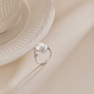 Elegant S925 silver adjustable open ring featuring a round natural freshwater pearl