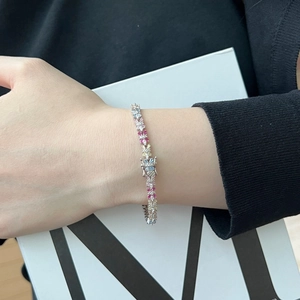 Close-up of S925 sterling silver bracelet featuring vibrant multicolored butterfly zircons