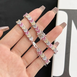 Close-up of S925 silver tennis bracelets with colorful heart-shaped cubic zirconia links
