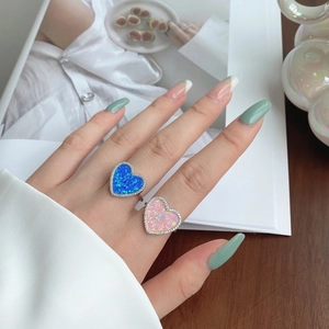 S925 silver heart rings with blue and pink opal stones and zircon halo on fingers