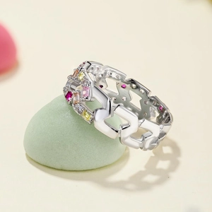 Bague en argent sterling S925 avec zircons colorés et design géométrique ajouré