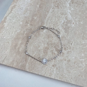 Elegant S925 sterling silver chain bracelet featuring a round CZ center and pave halo