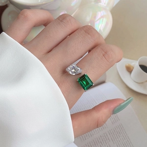 S925 sterling silver open ring with emerald cut green stone and teardrop diamond