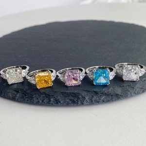 Close-up of S925 silver rings with radiant-cut colorful cubic zirconia in five vibrant shades