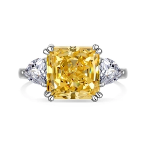 Elegant S925 silver ring with yellow radiant cut stone and trillion side gems