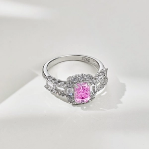 Detail shot of a S925 sterling silver ring featuring a pink ice-cut rectangular gemstone