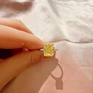 Macro shot of luxury S925 silver ring featuring a large radiant cut yellow zircon