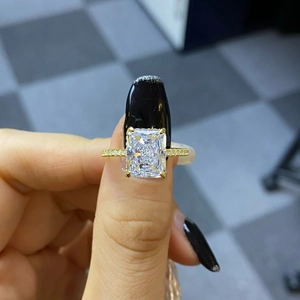 Close-up of a gold s925 silver ring featuring a large rectangular ice-cut zircon stone