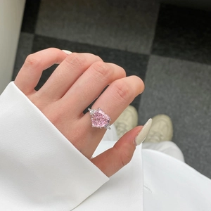 Close-up of S925 silver ring featuring a pink heart-shaped radiant cut gemstone