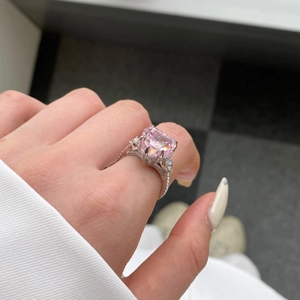 Luxurious S925 sterling silver ring featuring a large radiant pink heart-shaped gemstone