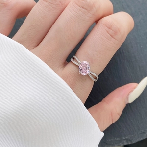 S925 sterling silver ring with oval pink zircon and crisscross micro-pave setting band