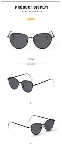 Three-view display of cat-eye sunglasses with slim black metal frames and grey lenses