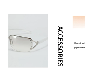 Detail of frameless square Y2K sunglasses with gradient lenses and rhinestone accents