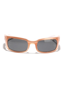 Rectangular peach translucent sunglasses with dark grey lenses in a minimalist trendy style