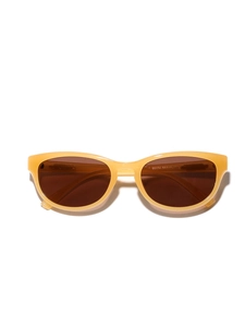Cat eye sunglasses with translucent yellow frame and dark brown UV lenses from top view