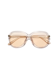 Lunettes aviateur oversize champagne avec branches dorées sur fond blanc neutre