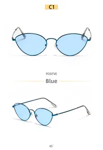 Detail view of cat-eye metal frame sunglasses with blue lenses in multiple angles