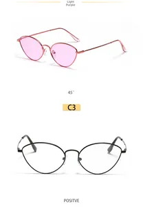 Detail view of cat-eye metal frame sunglasses in light purple and black finishes