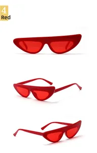 Detailed views of red narrow cat-eye sunglasses with streamlined plastic frames