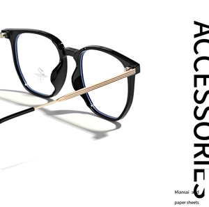 Detail of TR90 glasses frames with gold metal temples and anti blue ray lens technology