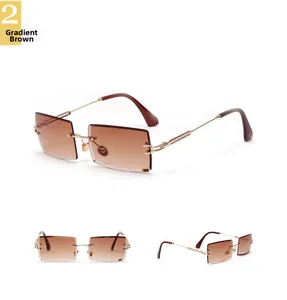 Detail view of rimless square sunglasses with gradient brown lenses and golden metal frame
