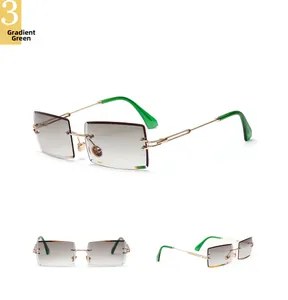 Detail view of rimless rectangular sunglasses with gradient lenses and gold temples
